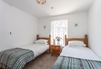 Bedroom two is complete with two single beds allowing this to be the perfect property for a family holiday by the sea.