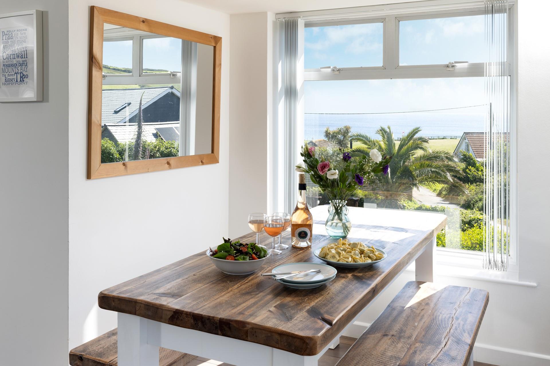 The bench-style seating area is surrounded by large windows so you can indulge in the glorious views whilst you eat!
