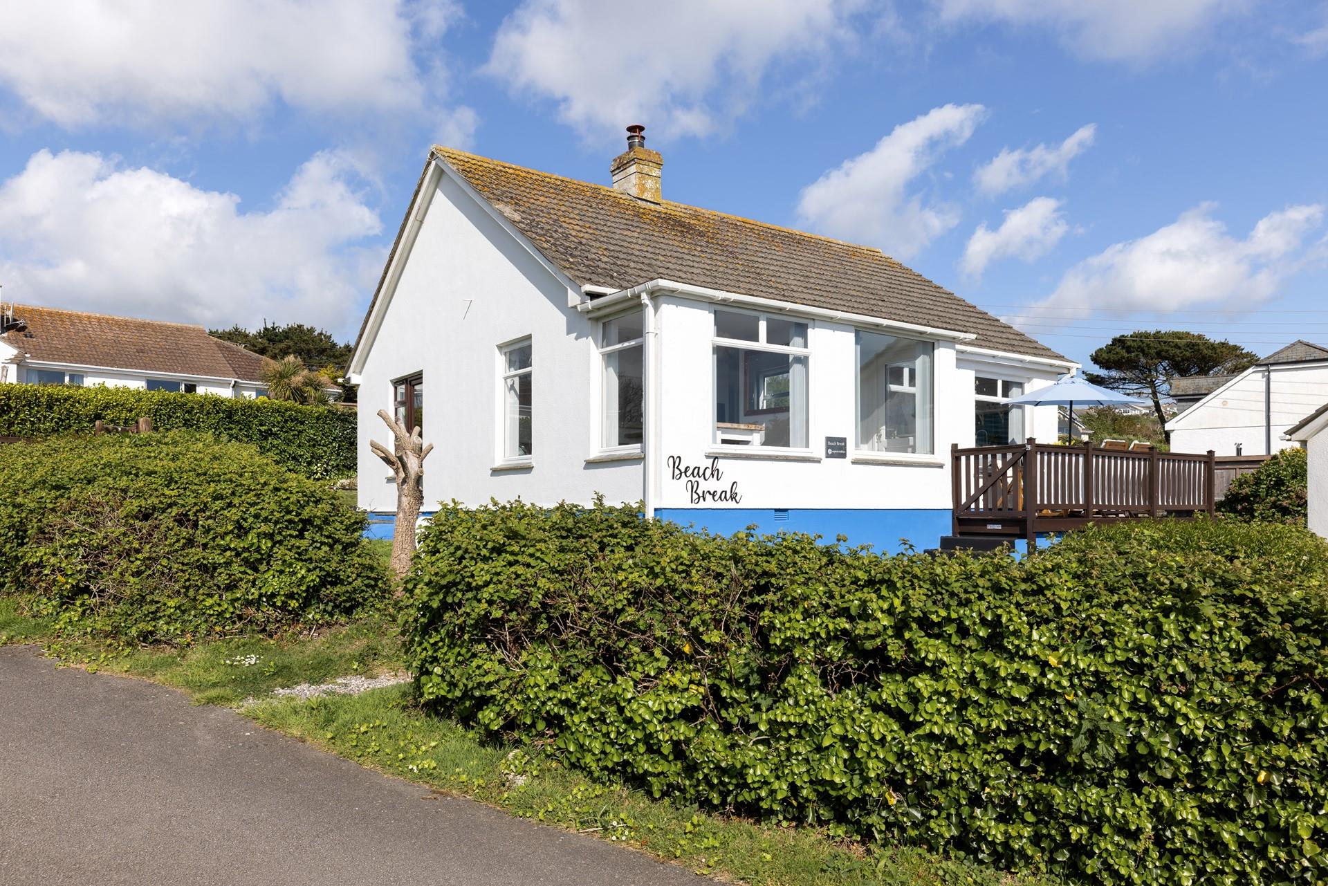 Large windows flood the property with natural light and showcase the postcard-worthy views.