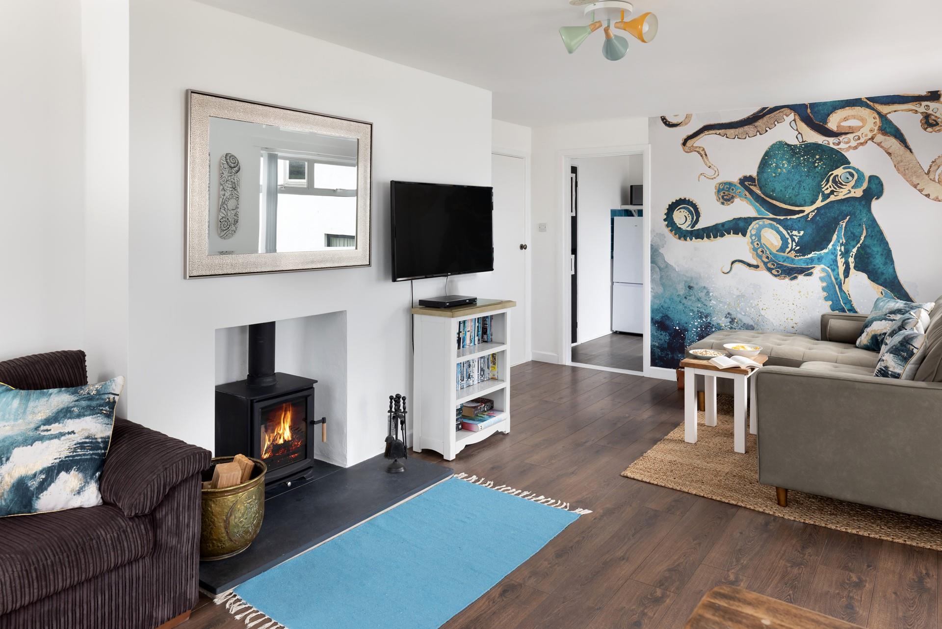 Relax and unwind in front of the log-burner on a chilly evening. 