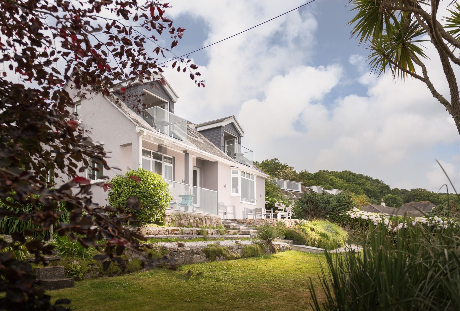 Let your furry friends run off some steam in the front lawned garden.