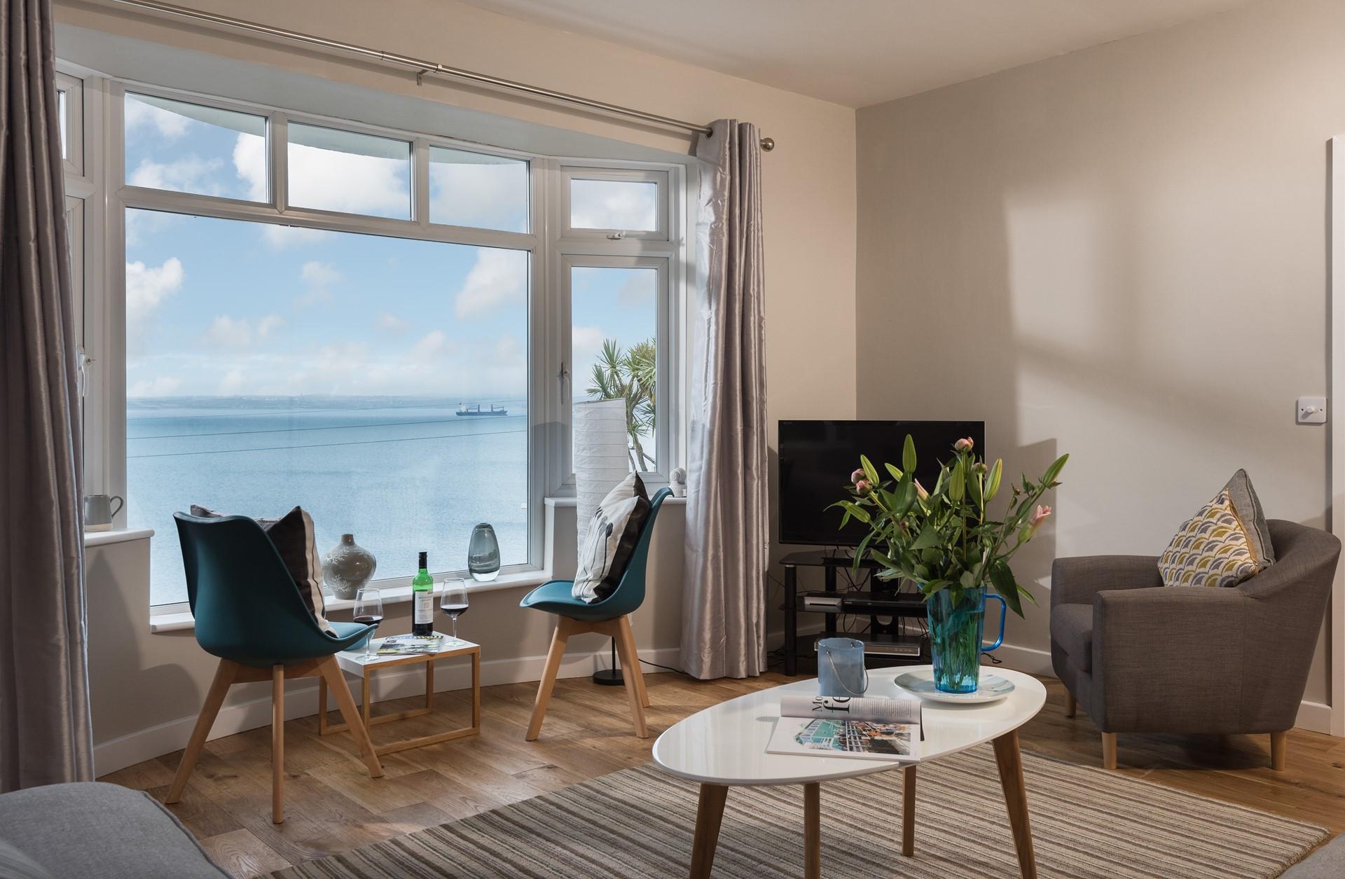 Watch the boats as they come and go from the working Newlyn Harbour. 