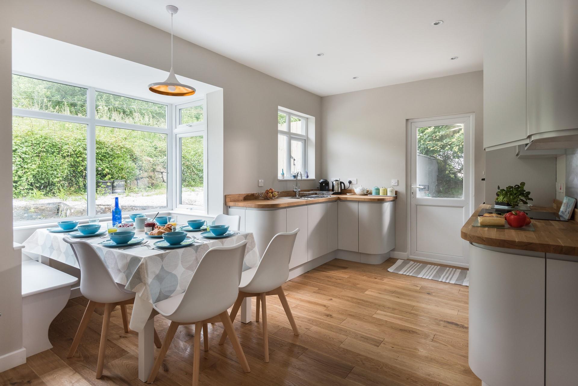 Cook up a storm in the well-equipped kitchen using ingredients bought locally.