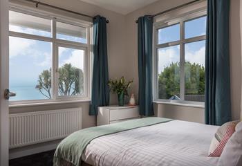 Bedroom 1 is on the ground floor and is perfectly decorated in calming blue and green tones.