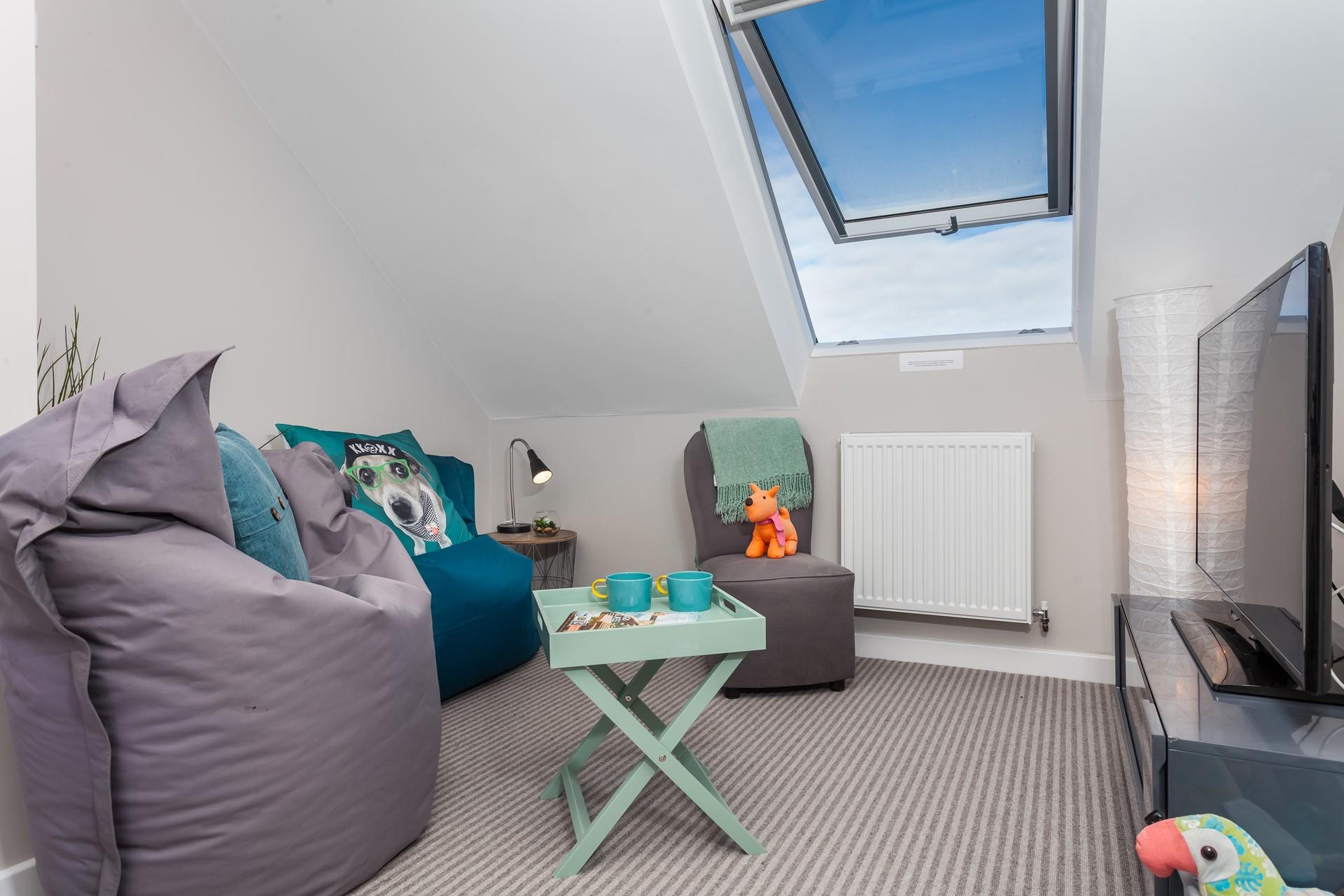 The snug area is the perfect space for the children to relax.