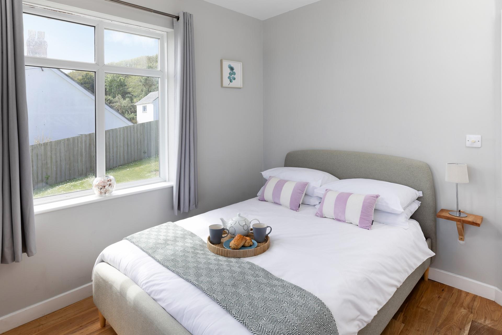 Bedroom 1 is on the ground floor making it the perfect place to roll into bed after a day of adventures. 