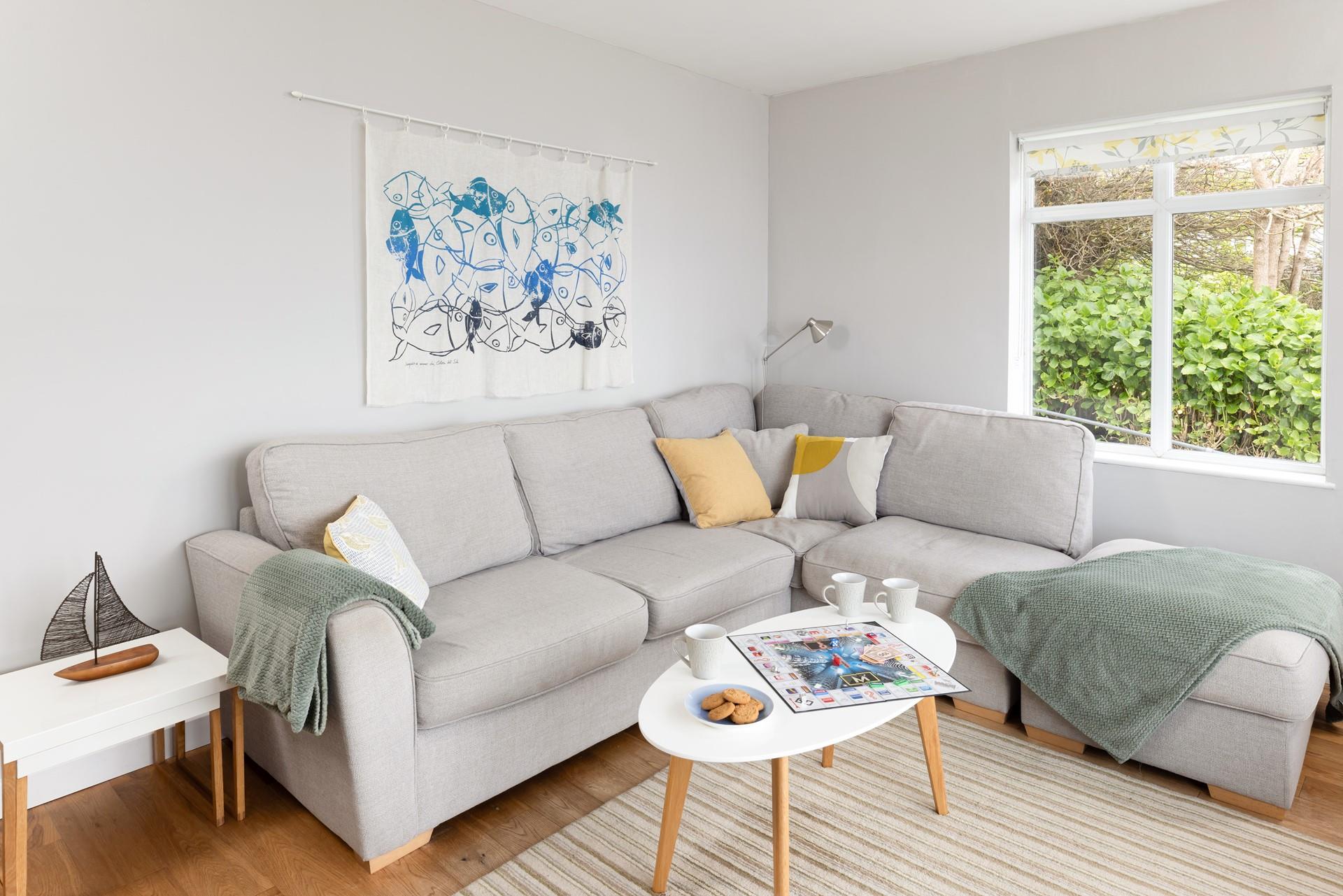 Enjoy your morning coffee on the plush sofa while watching the ocean sparkle over Mount's Bay.
