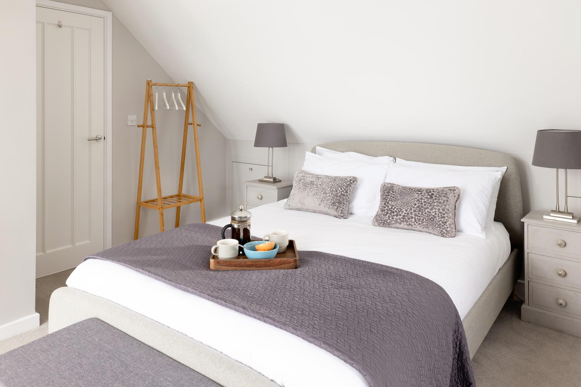 Wake up in the spacious king-size bed to a beautiful sunrise over the ocean.