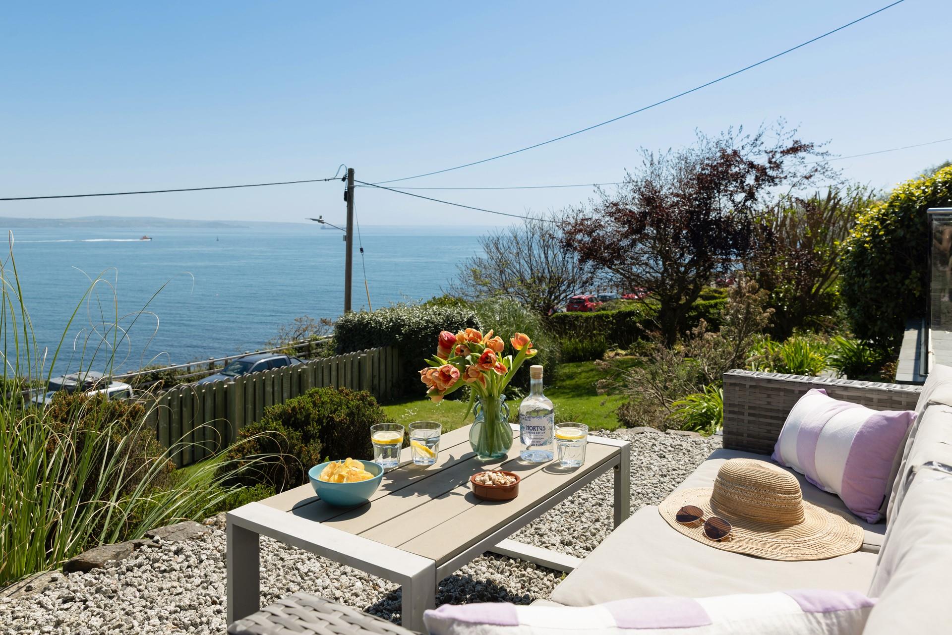 Sit and enjoy the far-stretching sea views from the front of Resoon.