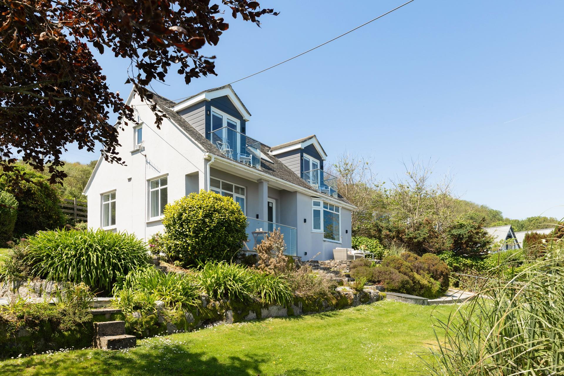 Let your furry friends run off some steam in the front lawned garden.