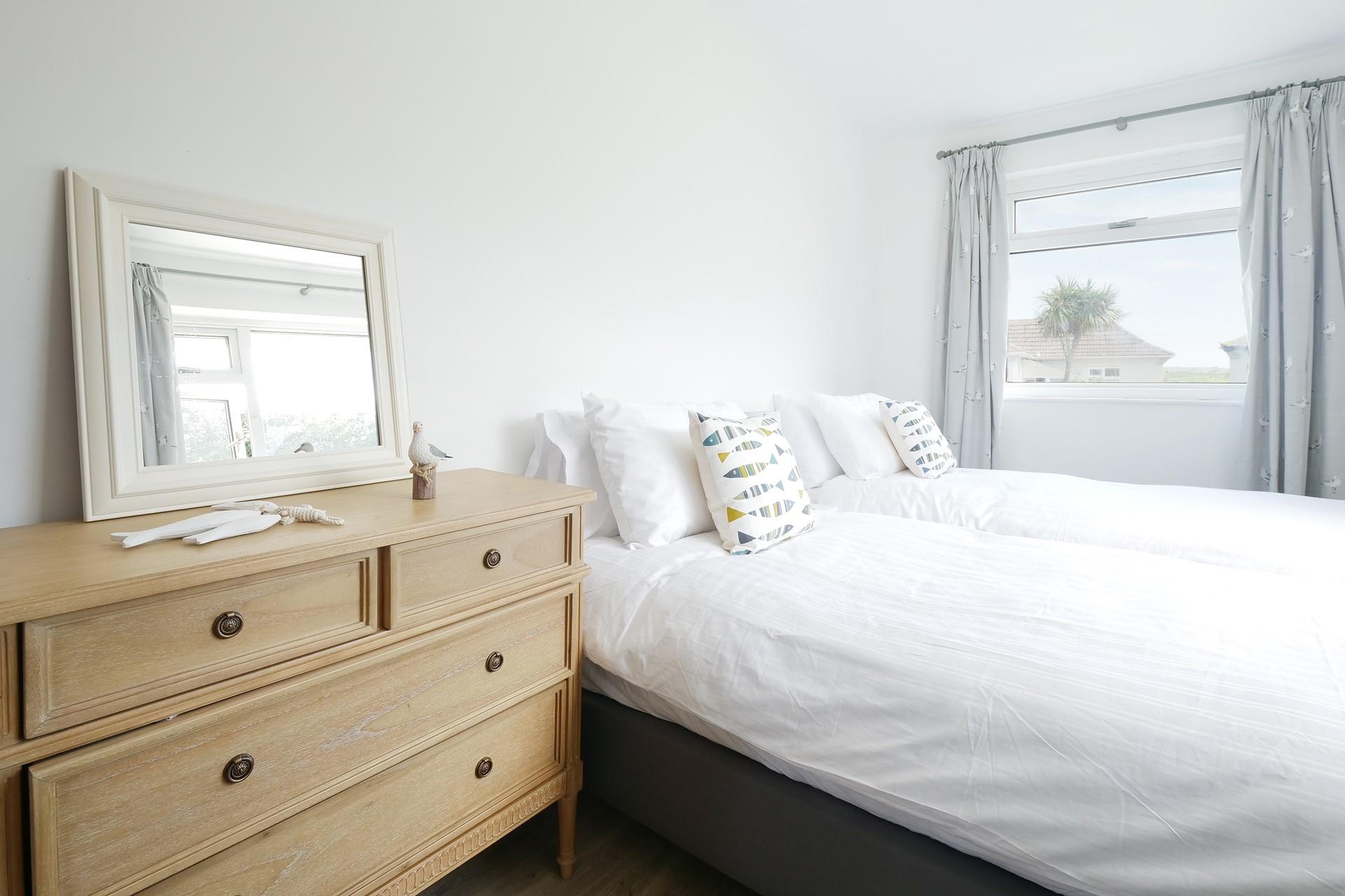 Bedroom 2 has twin beds perfect for young adults or children.