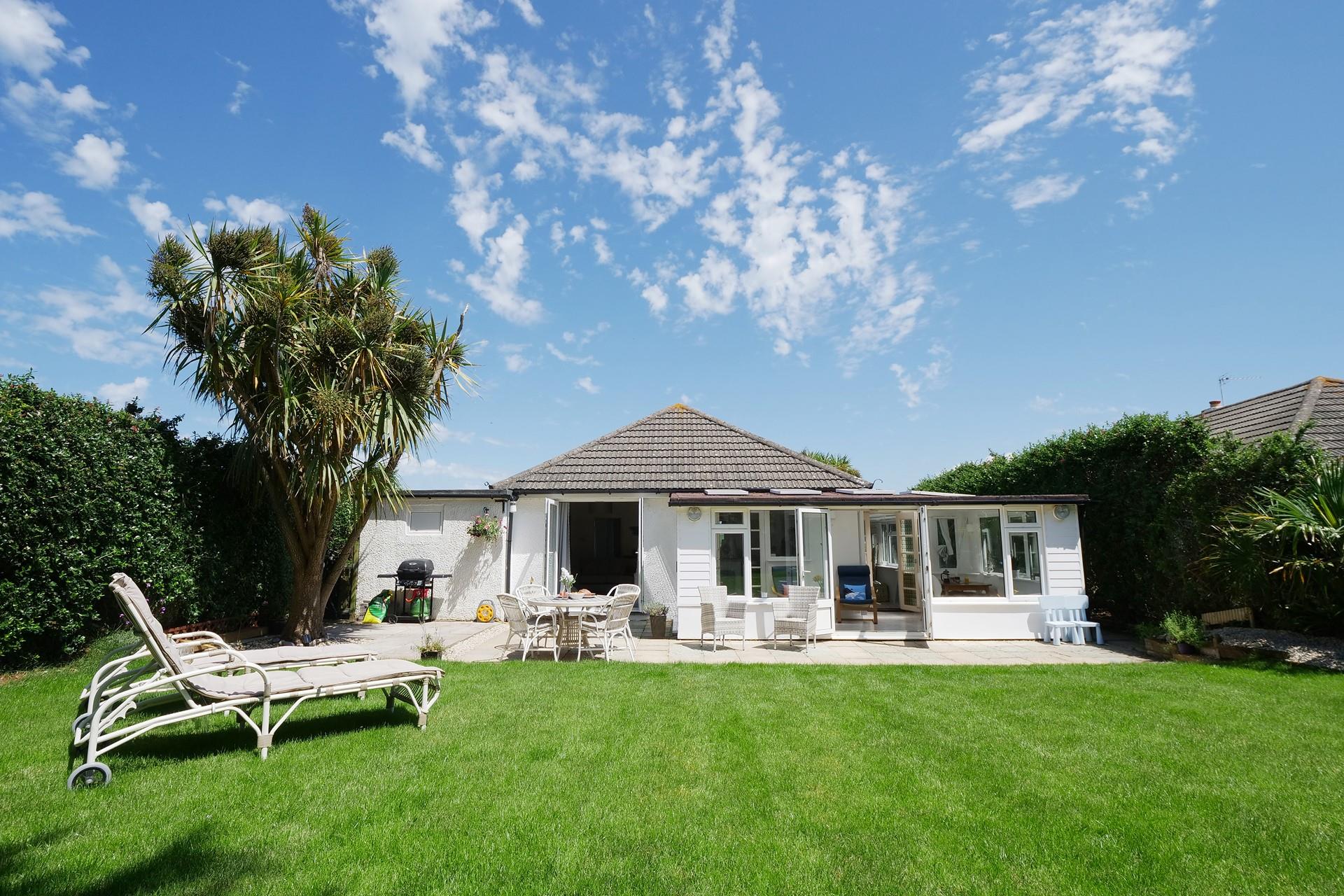 Soak up the sunshine in the large garden in the warm summer months.