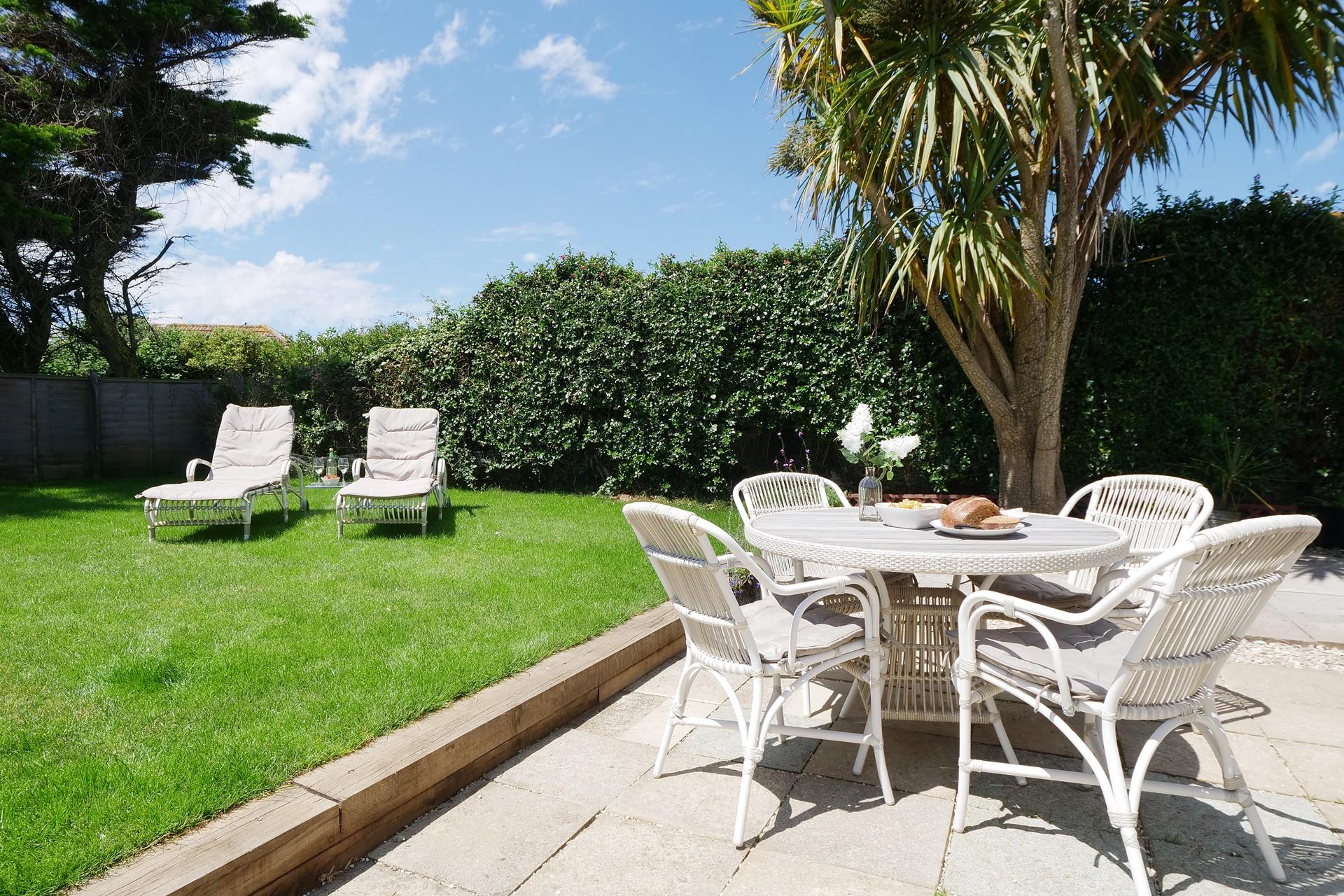 Enjoy long lazy lunches alfresco in the large garden.