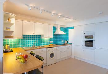 The bright, modern kitchen is a joy to cook in!
