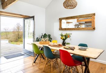 The dining table is created using reclaimed wood and is the perfect space for the family to enjoy meals together. 