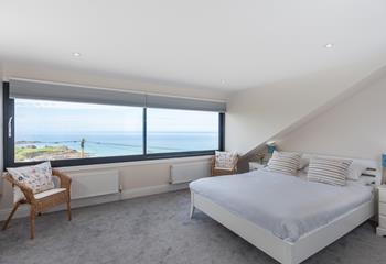 Wake up in the soft sheets and open the blinds to stunning sea views.