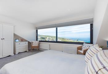 Tuck into bed and watch the sunset over the sea after a memorable day in Cornwall.