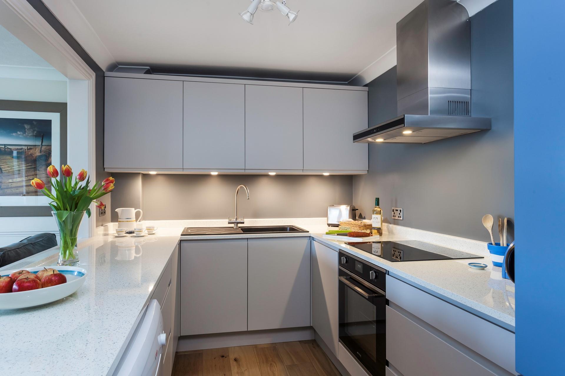 The kitchen is modern and sleek with plenty of worktop space to cook up a storm.