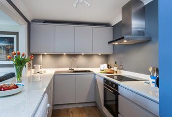 The kitchen is modern and sleek with plenty of worktop space to cook up a storm.