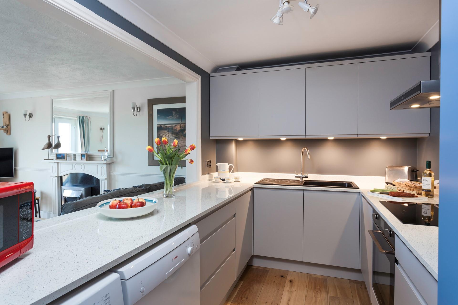 The kitchen is really well-equipped including a dishwasher, washing machine and microwave.