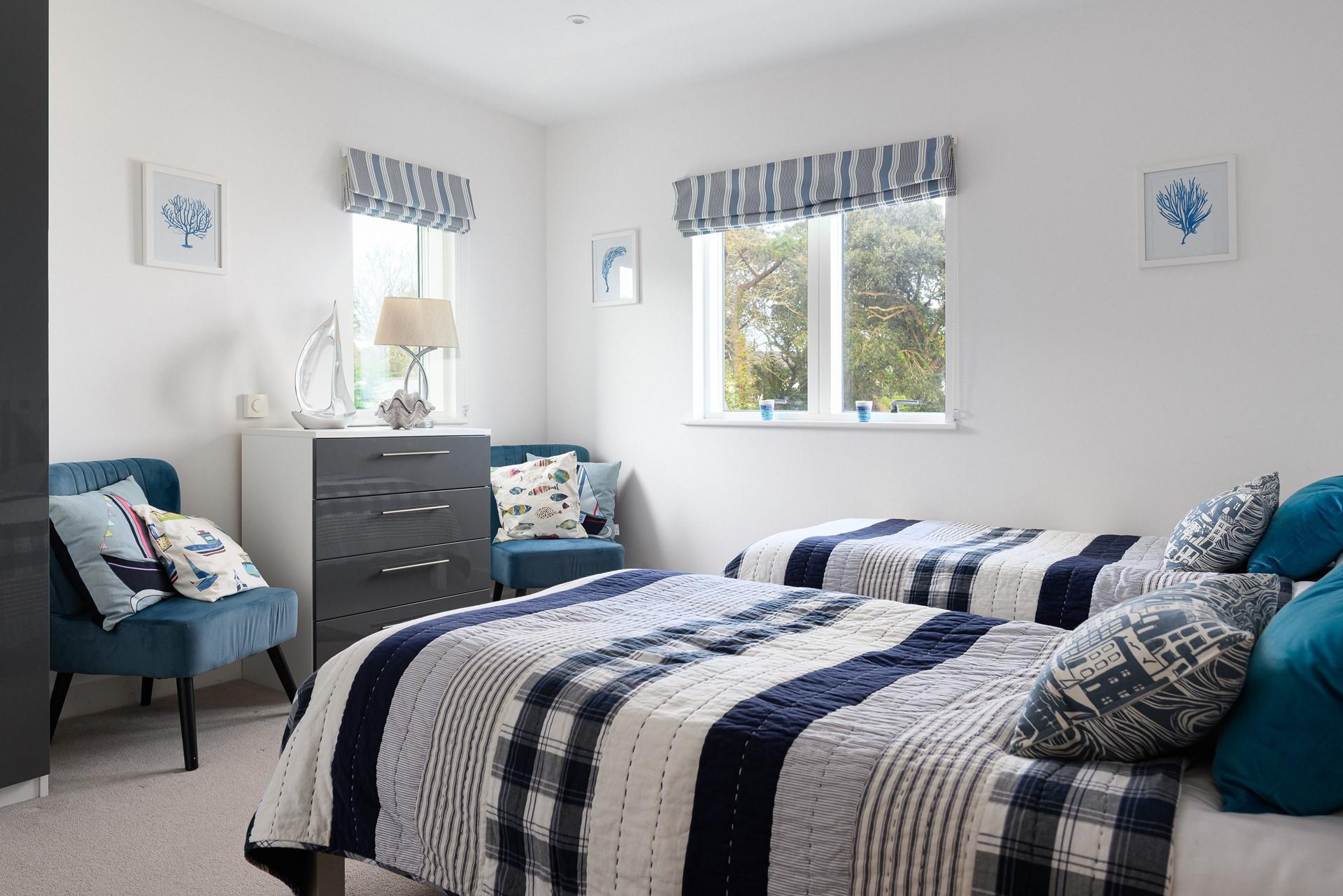 Bedroom 3 has twin beds allowing for flexible sleeping arrangements.