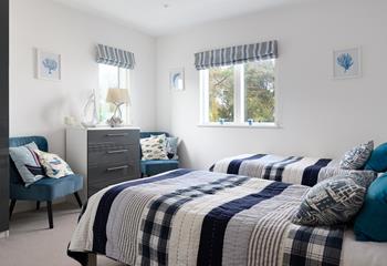 Bedroom 3 has twin beds allowing for flexible sleeping arrangements.