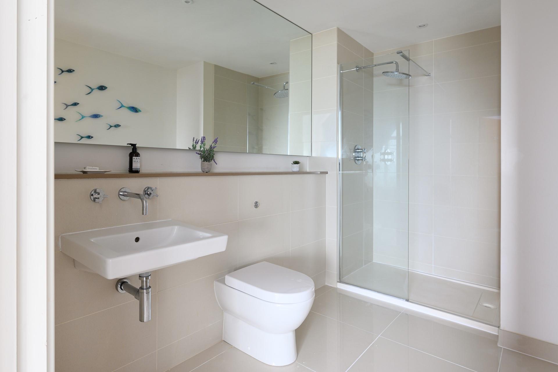 Wash off sandy toes in the rainfall shower.