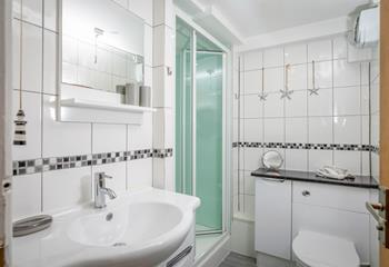 The bathroom has all you need after a day on the beach!