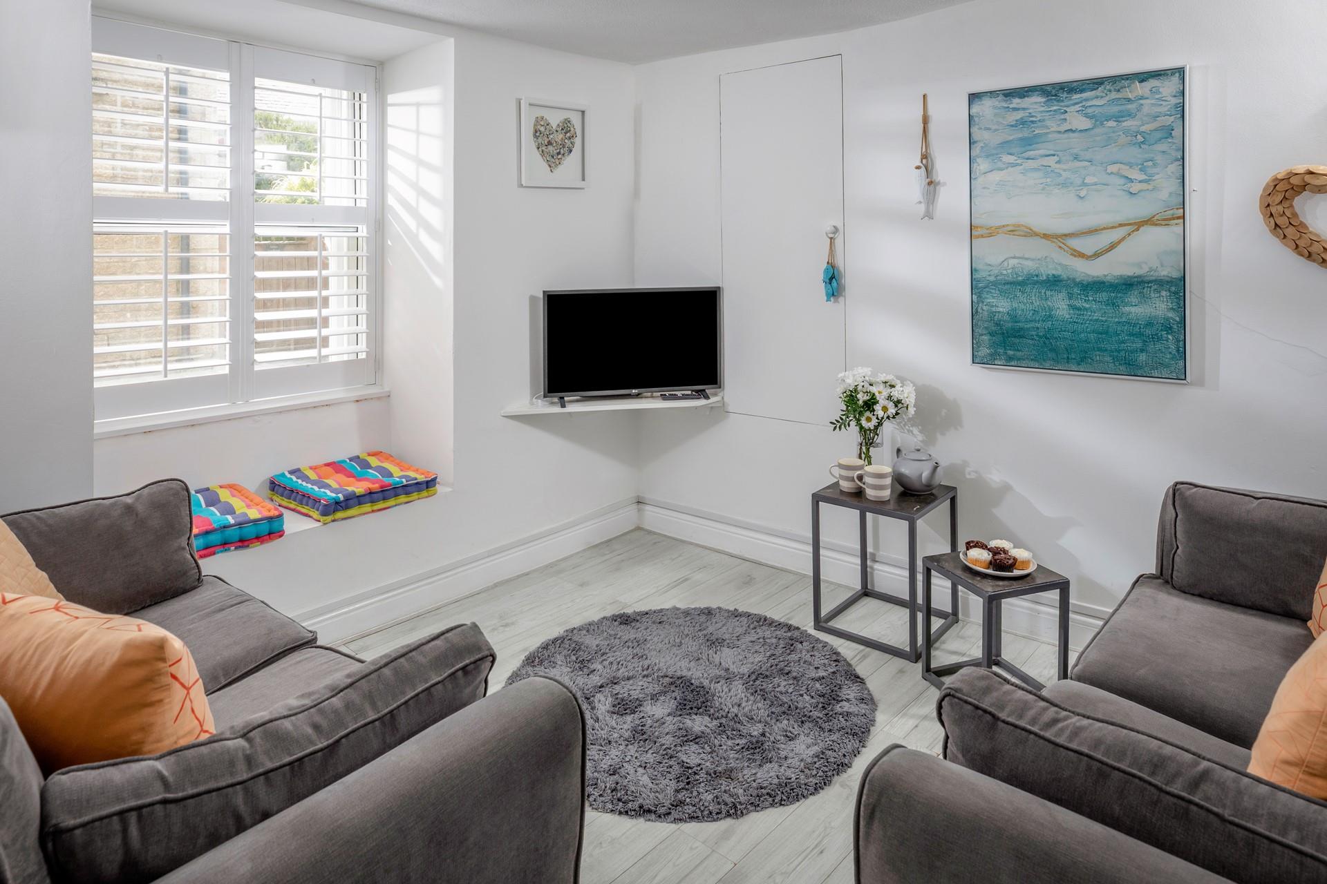 Fun pops of colour bring the magic of the seaside indoors in this wonderful bolthole.