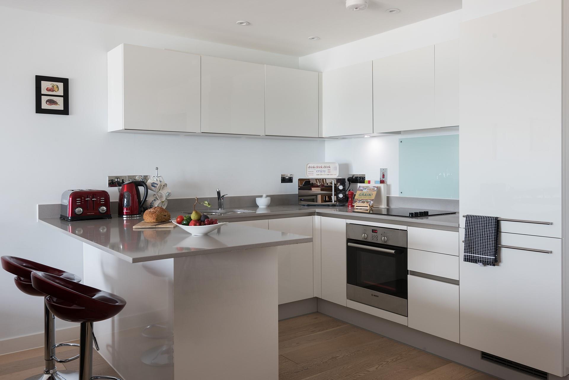 Read the paper with a coffee at the breakfast bar before heading to the nearby beach.