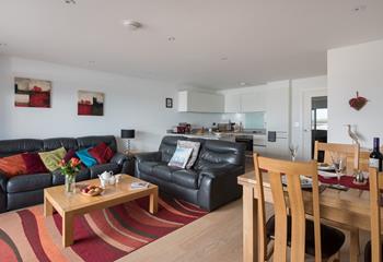 The living area is a warm and cosy space, perfect for snuggling up after a day of exploring.