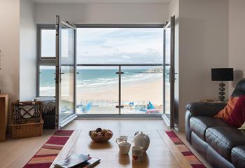 The open plan living area has unbeatable views of Fistral beach from the Juliet balcony. 