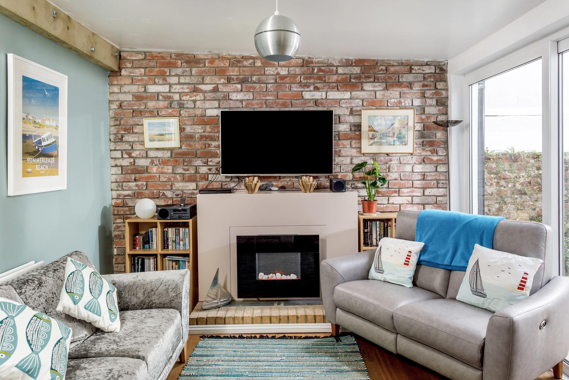 The sitting room is perfect for cosy nights in watching your favourite film.