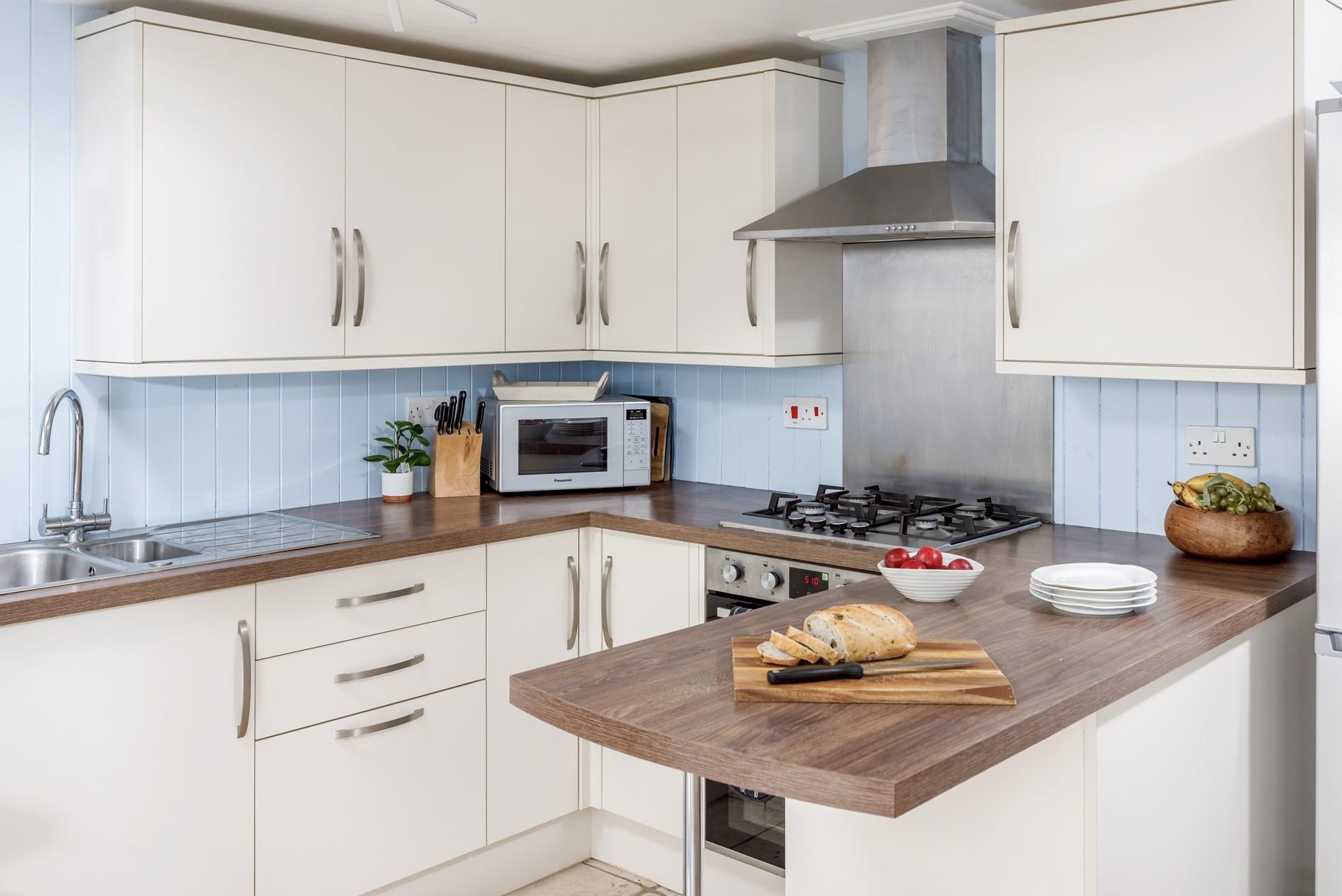 The kitchen is well-equipped for the chef in the family to cook up a feast.