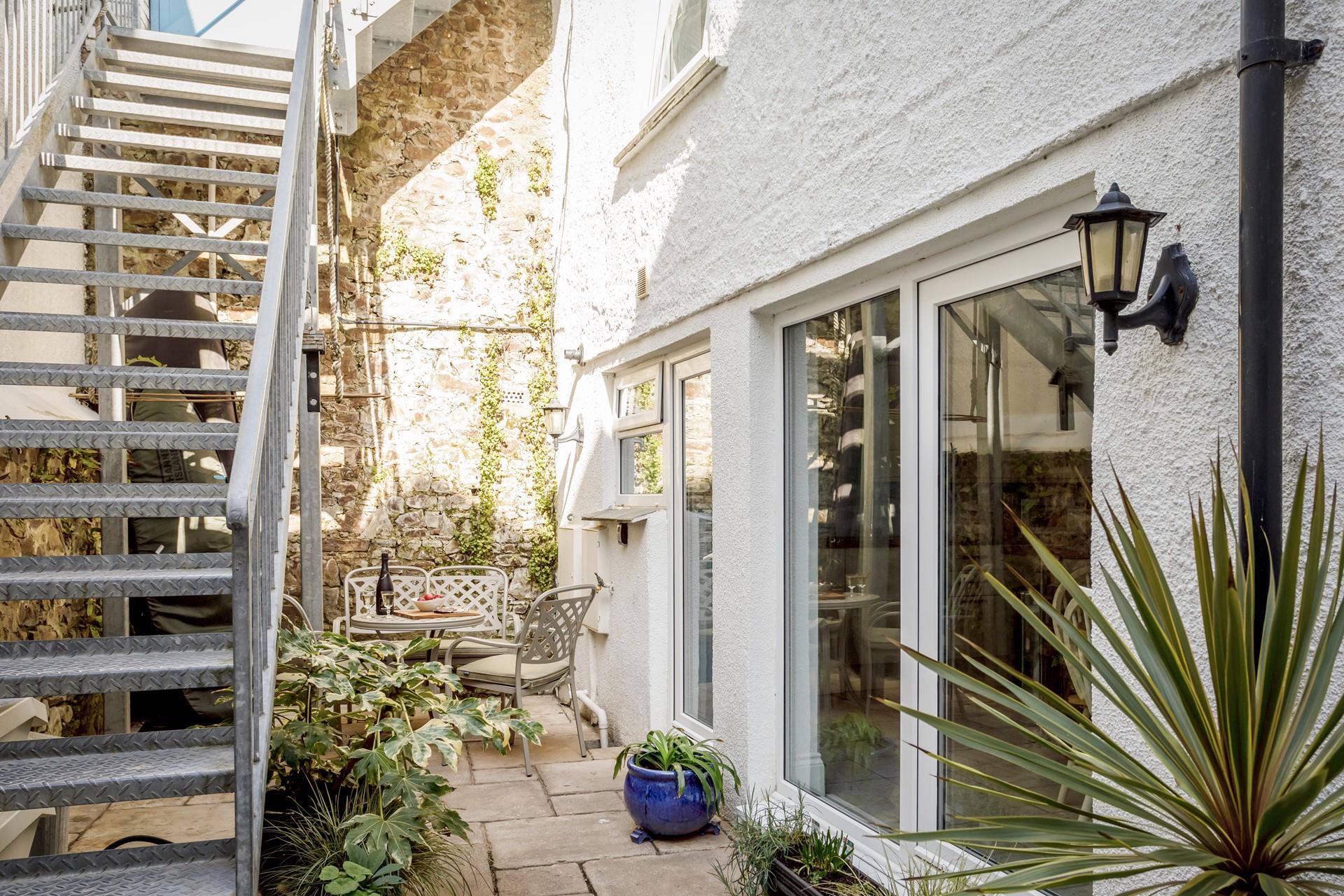The private courtyard is the perfect spot to sip a glass of wine and enjoy some nibbles on a sunny afternoon.