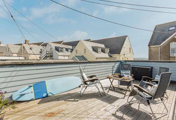 The upstairs private decking is a great place to store surfboards and paddleboards.