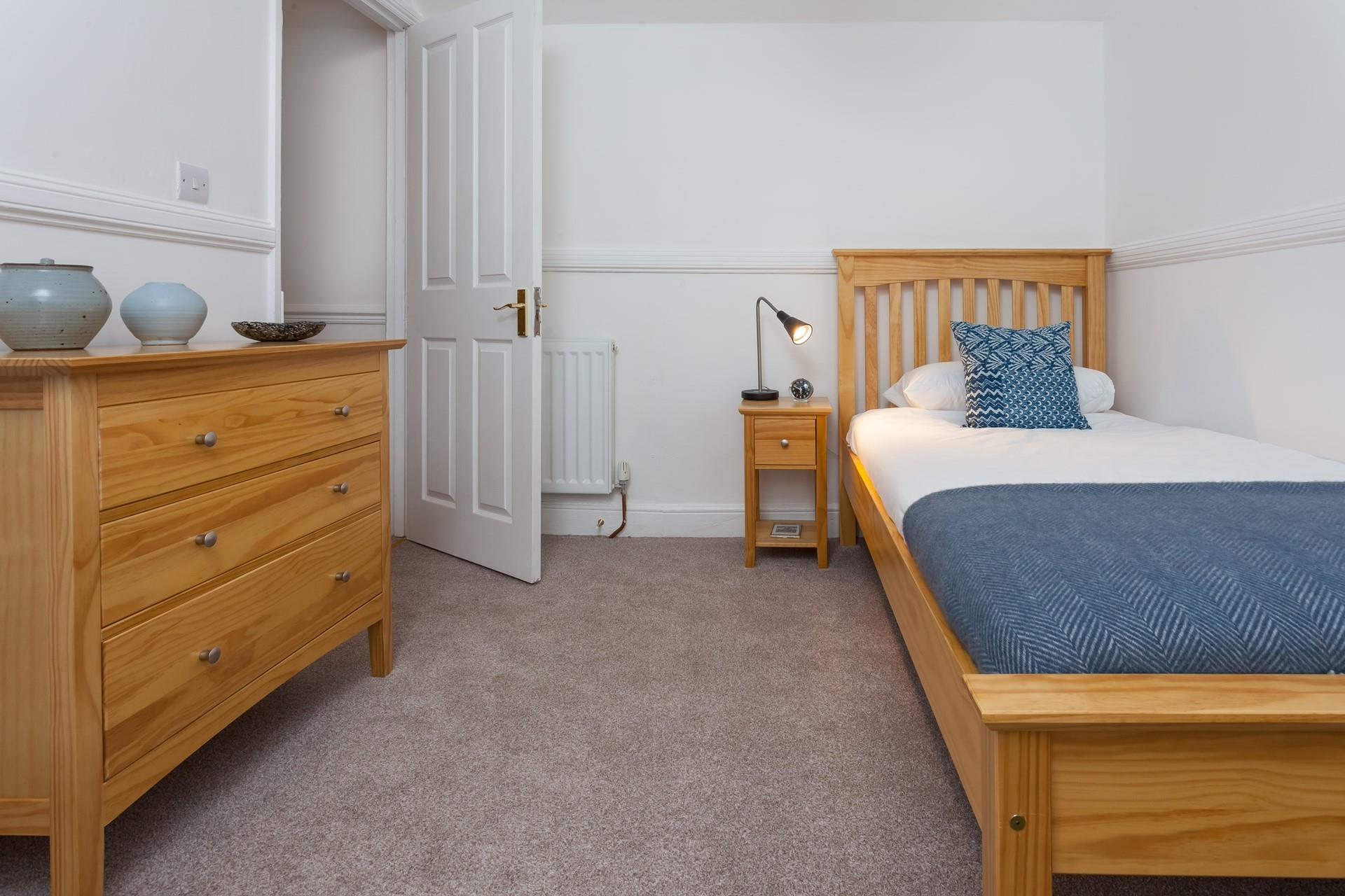 Shades of blue reflect the colours of the Cornish sea.