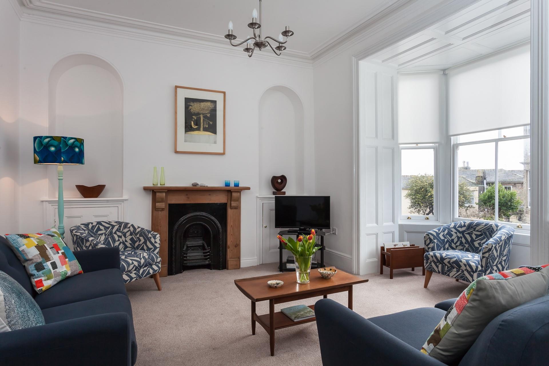 The cosy sitting room is perfect for spending quality time together as a family after memorable days.