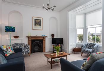 The cosy sitting room is perfect for spending quality time together as a family after memorable days.