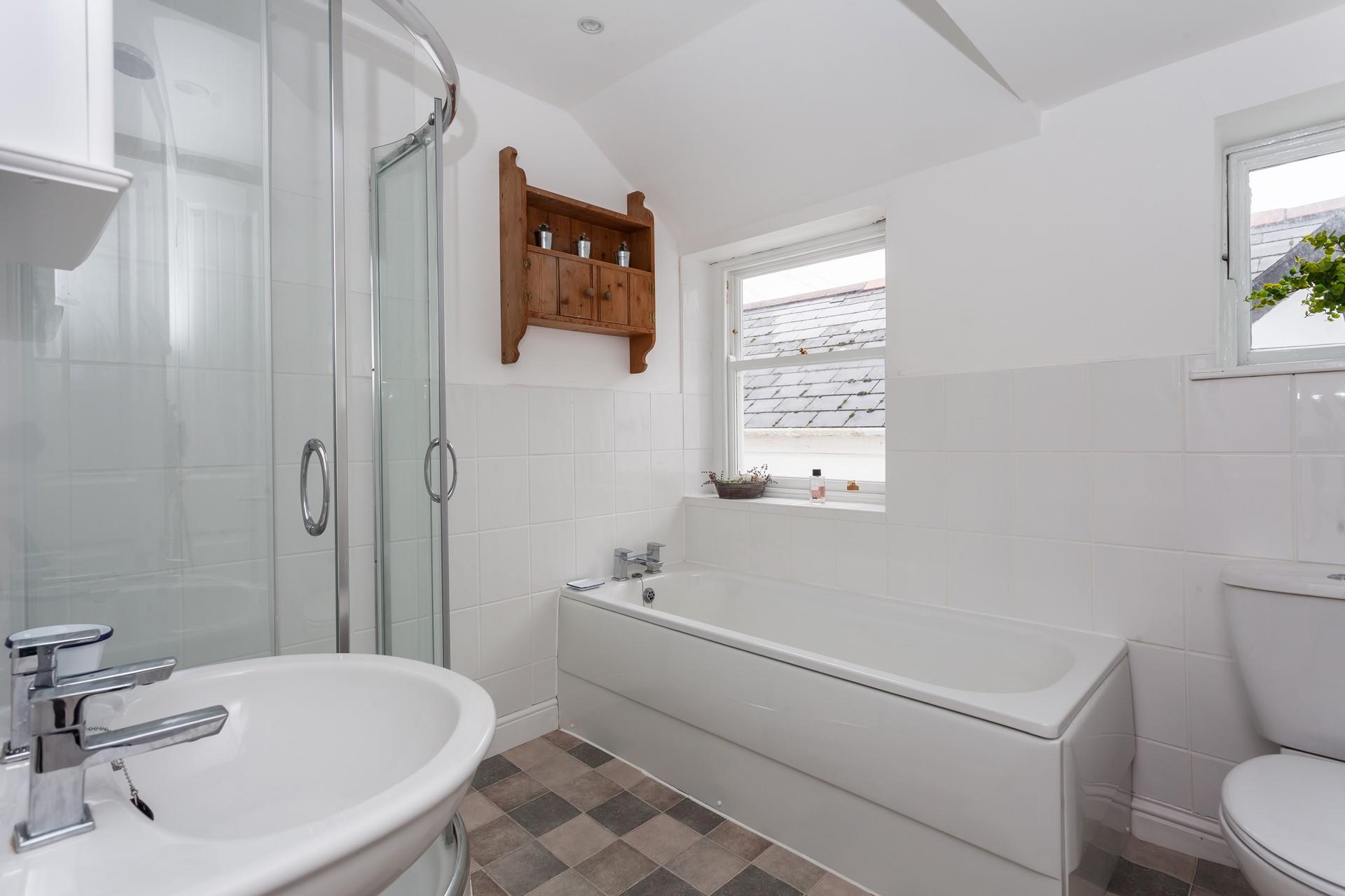 End your day with a relaxing bubble bath and glass of wine. 