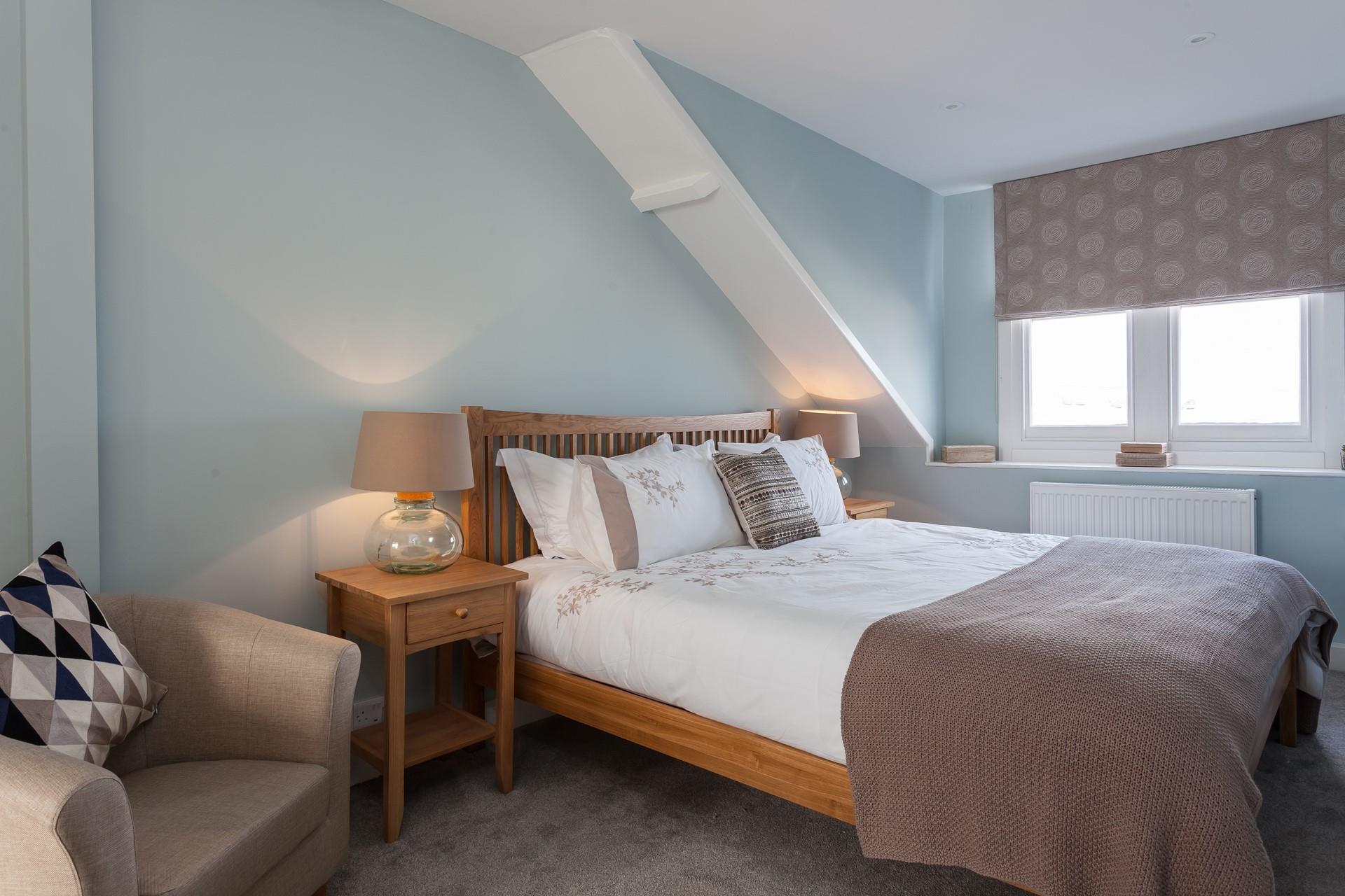 Bedroom 5 has a king size bed and an en suite shower room.