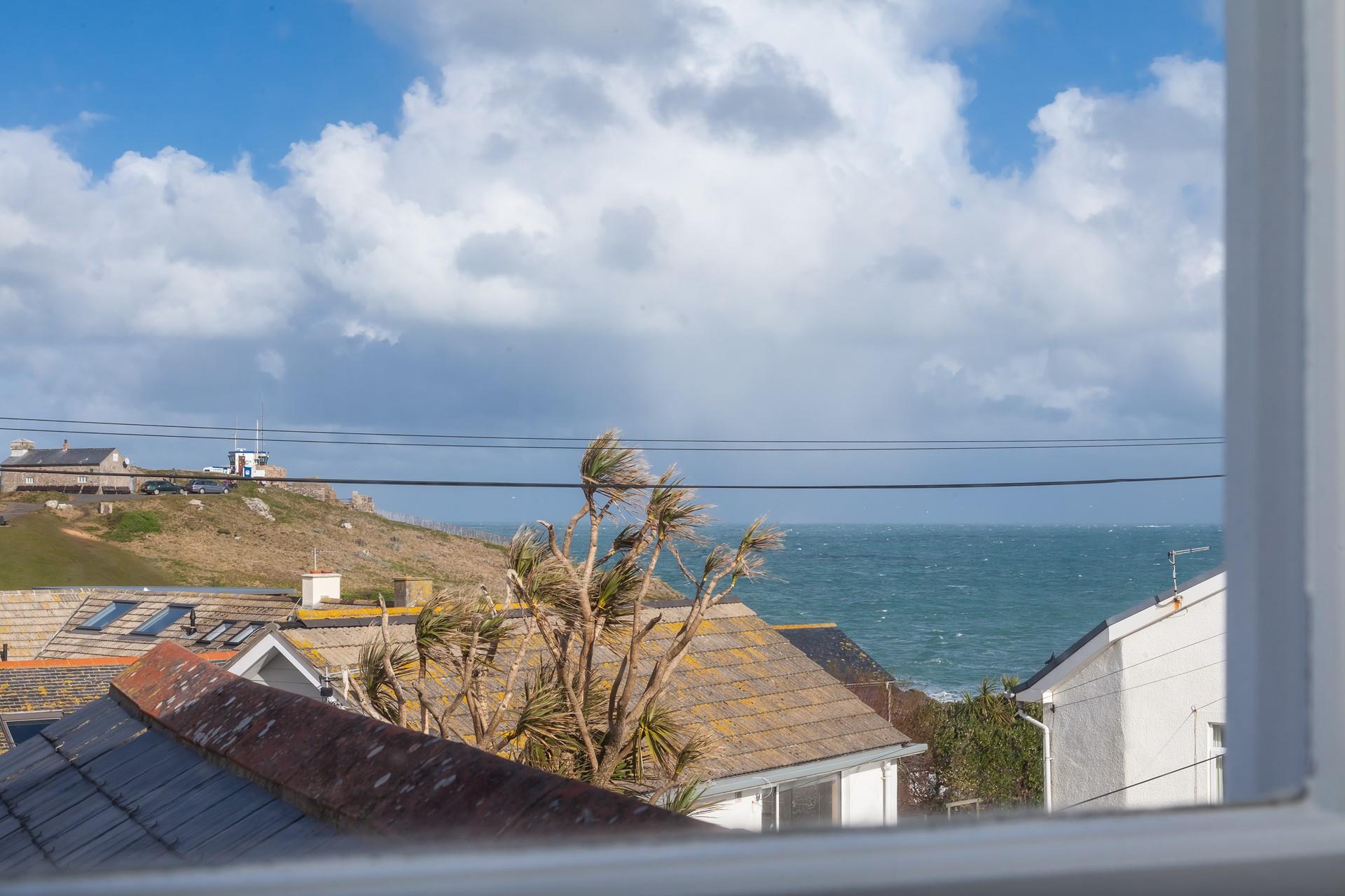 Take a moment for yourself as you admire the sea views from the cosy snug.