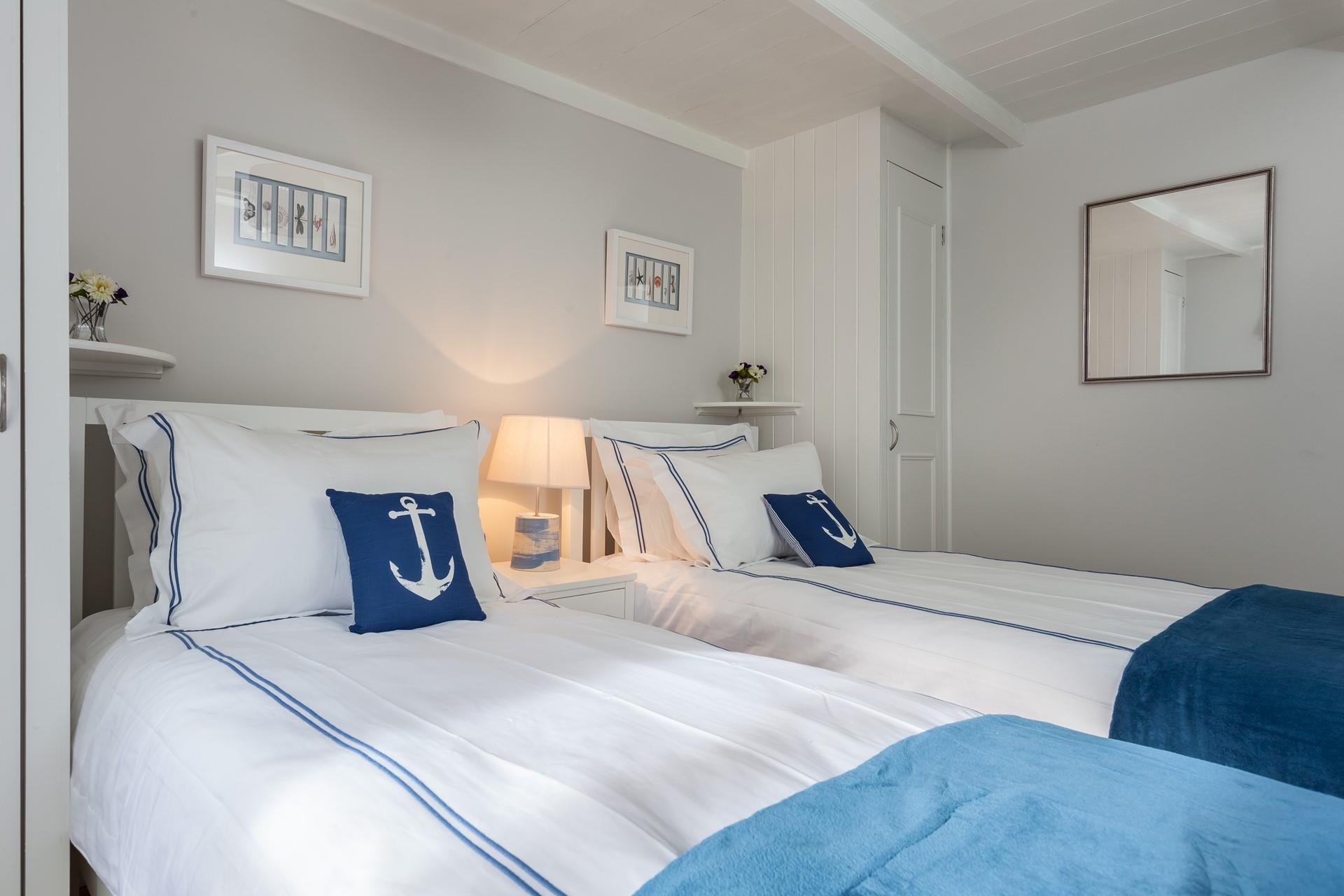 The twin room is a cosy space for the kids to spend their evenings.