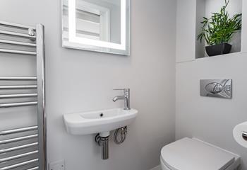 The modern en suite is a space to get ready in peace each morning.