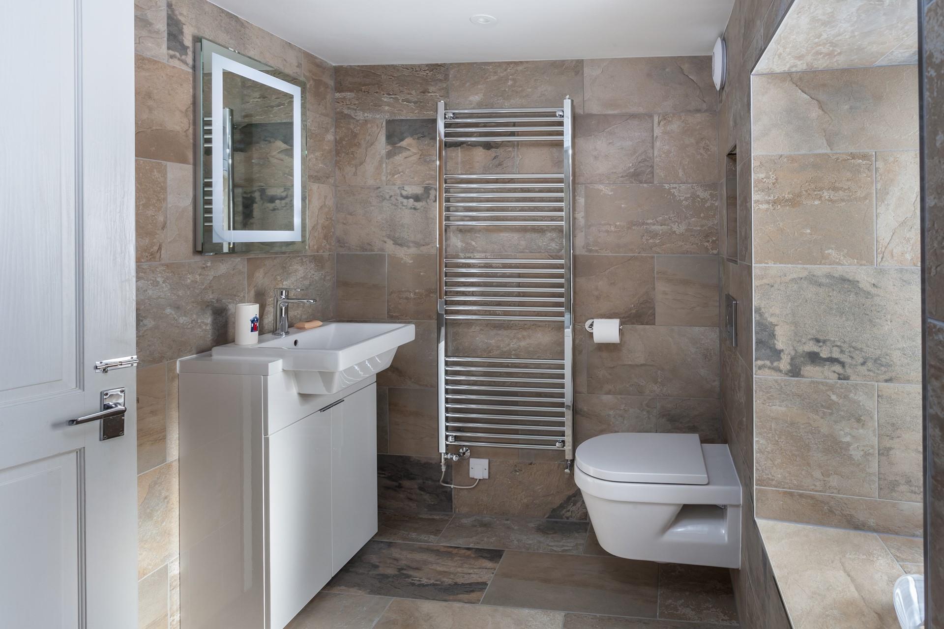 Put your towels on the heated rail so you can get out of the bath to soft fluffy towels.