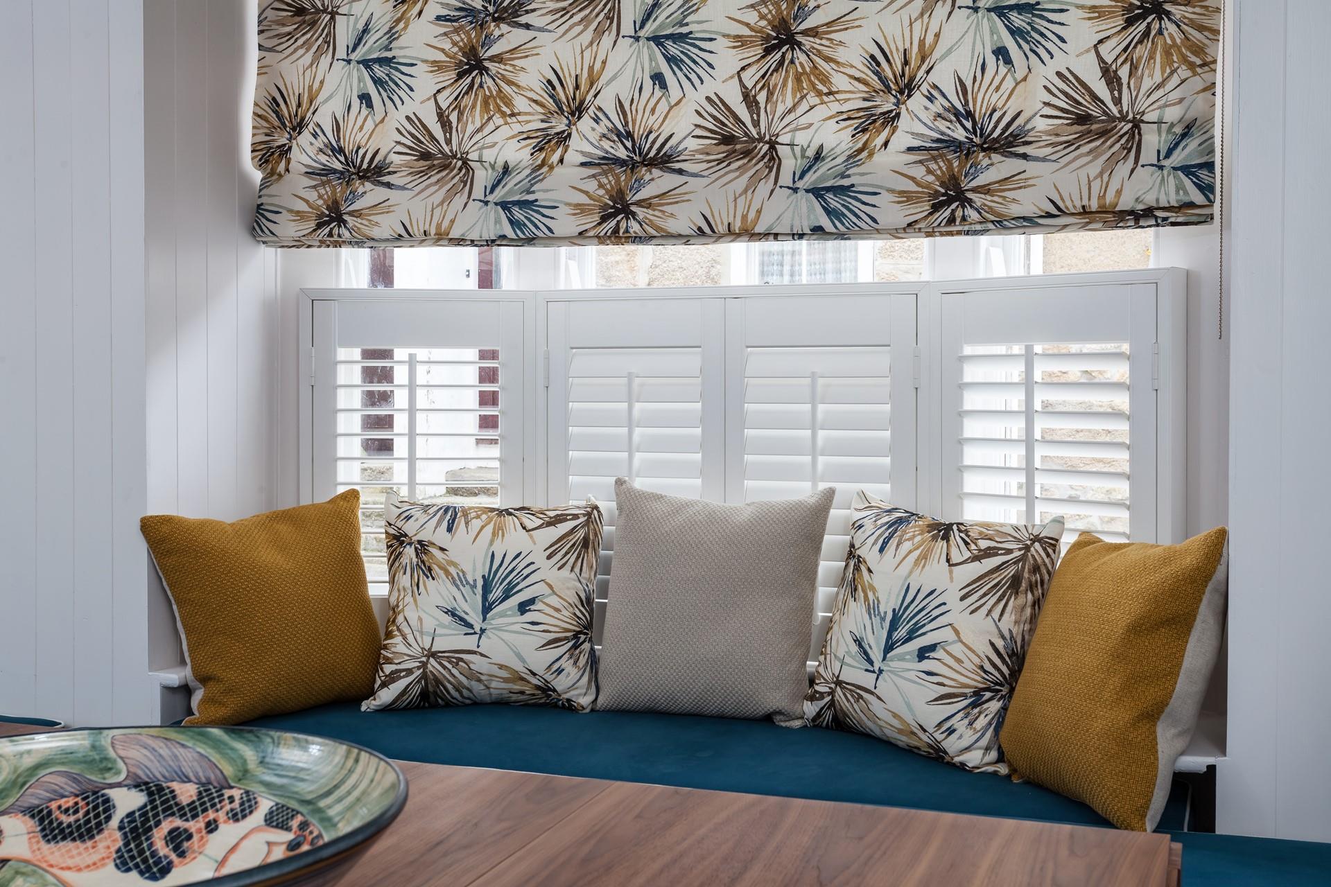 Sit in the window seat and enjoy a good book.