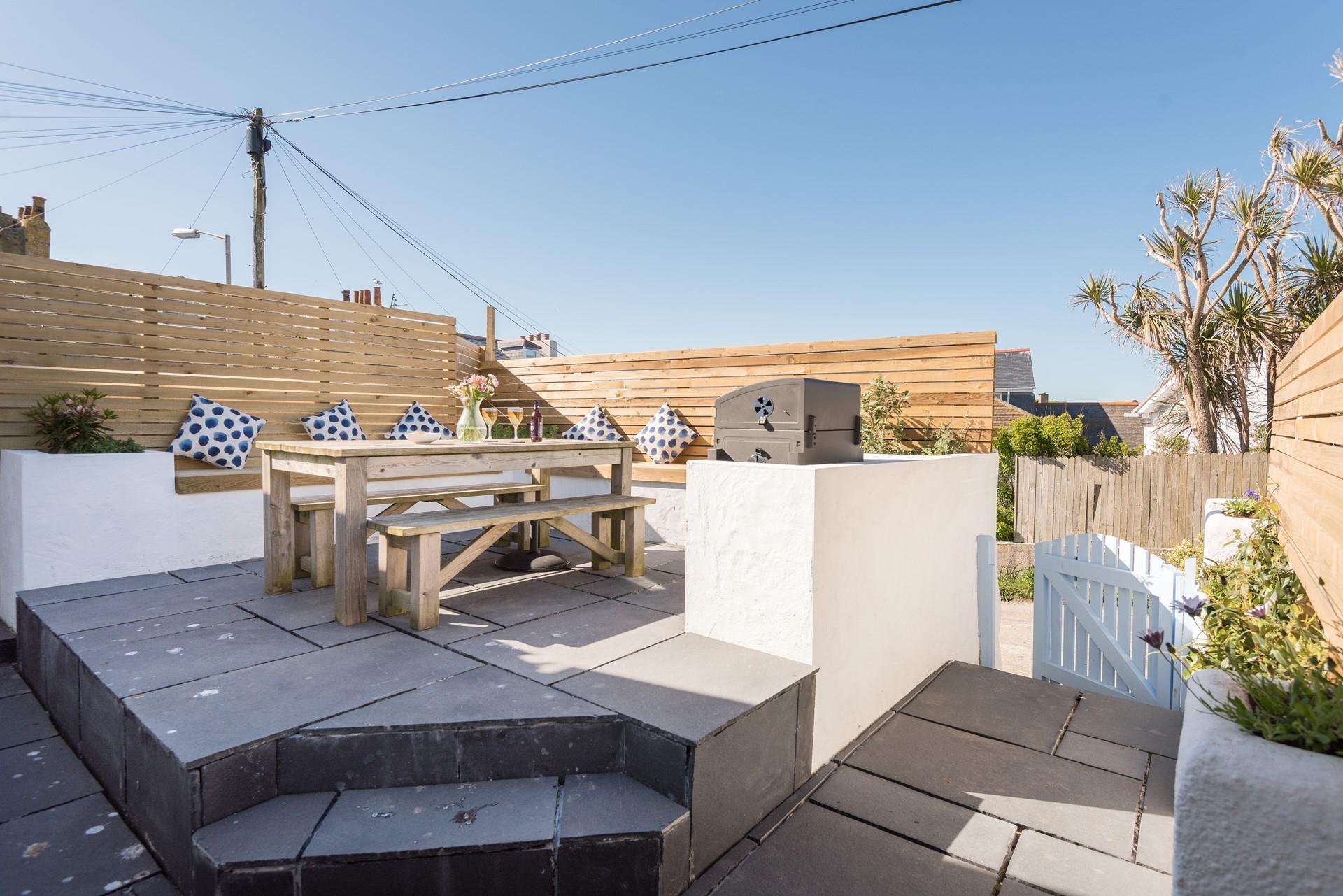 Outside space with BBQ.