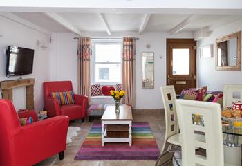 Relax in the evenings after days on the beach in the bright sitting room.