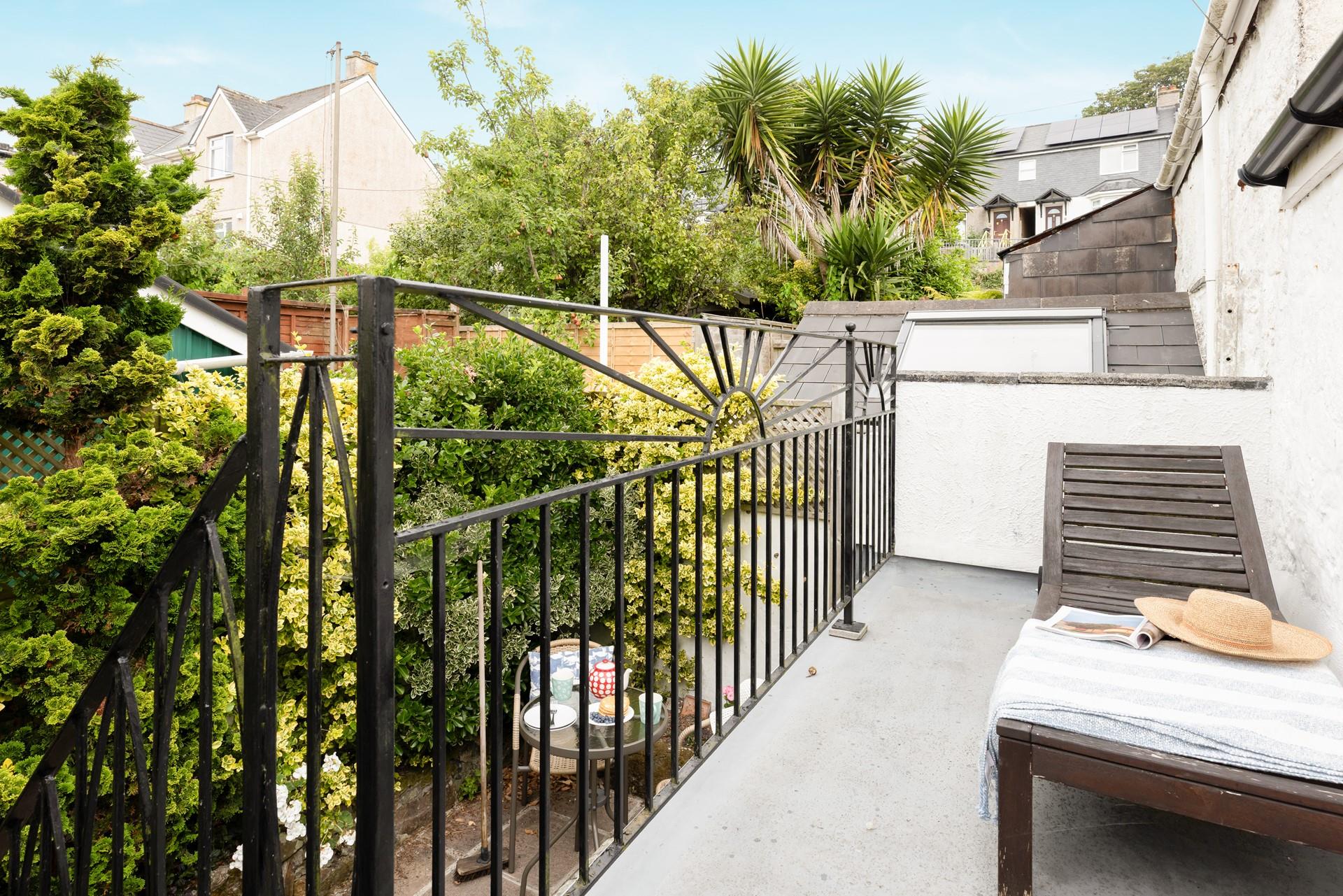 Tucked away, the cottage is surrounded by native flora and fauna.