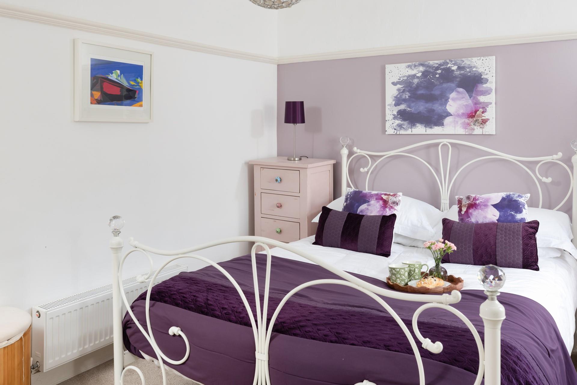 Bedroom 1 has a sumptuous king size bed.
